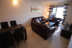 Comfort Apartment, Multiple Beds, Sea View | Living area | LCD TV, DVD player - Sea Front Apartments (Becici)