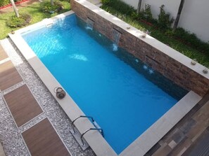 Outdoor pool, pool umbrellas, sun loungers