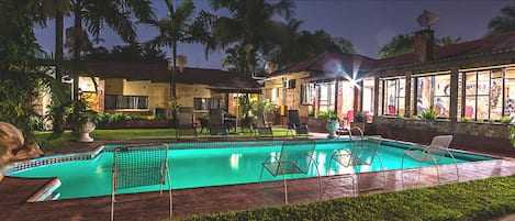 Outdoor pool, pool umbrellas, sun loungers