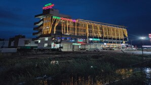 A multi-story hotel with a prominent sign reading "HOTEL MARYLAND."