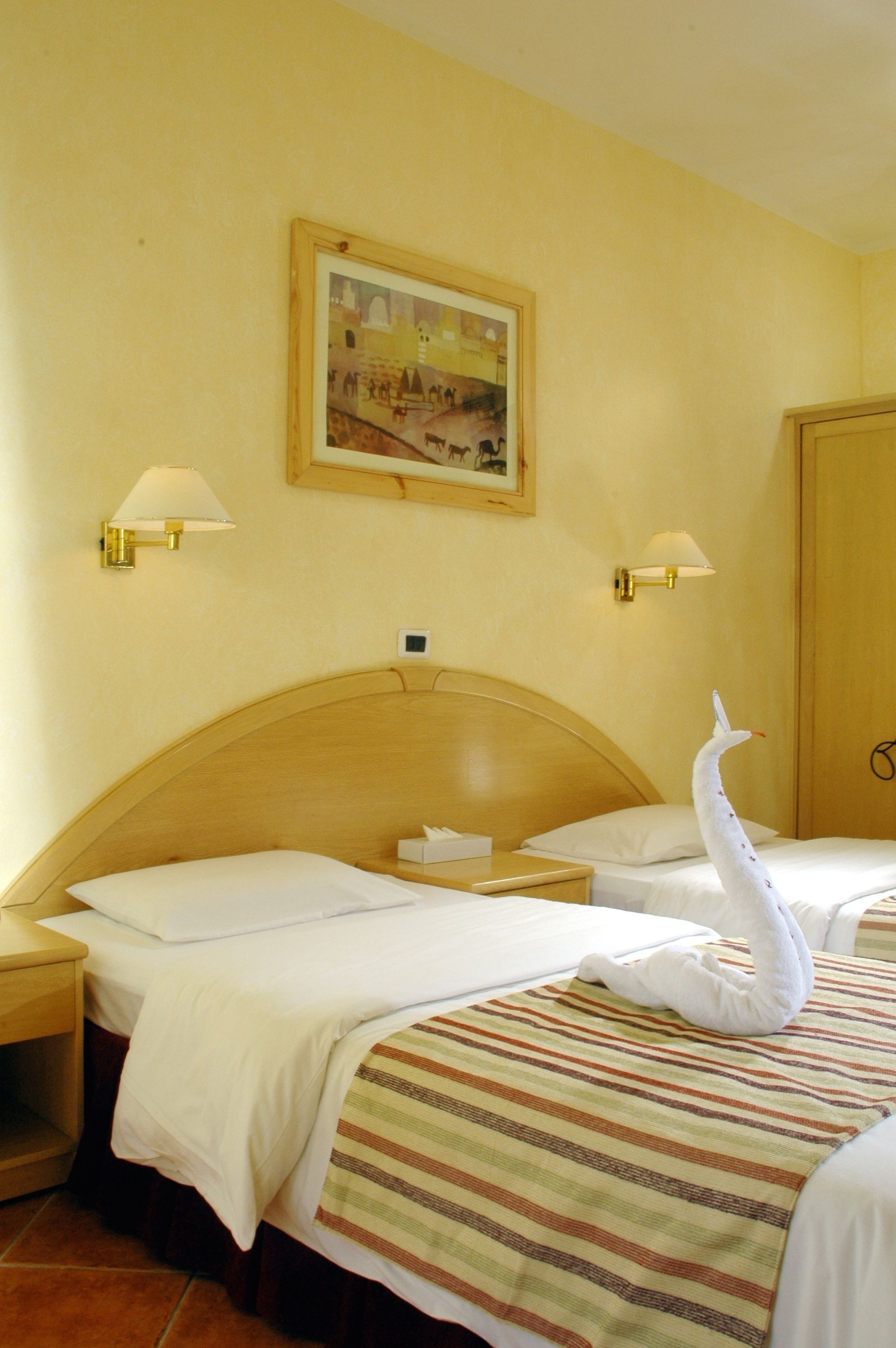 In-room safe, blackout drapes, bed sheets