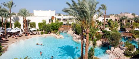 2 outdoor pools, pool umbrellas, pool loungers