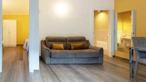Quadruple Room, 2 Queen Beds | Living area | Flat-screen TV - Feudo Galefona (Gratteri)