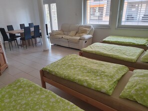 Family Apartment, Multiple Beds, Courtyard View | Living area | LCD TV, ping pong, heated floors - Apartments Akacijev Izvir (Miklavž na Dravskem Polju)