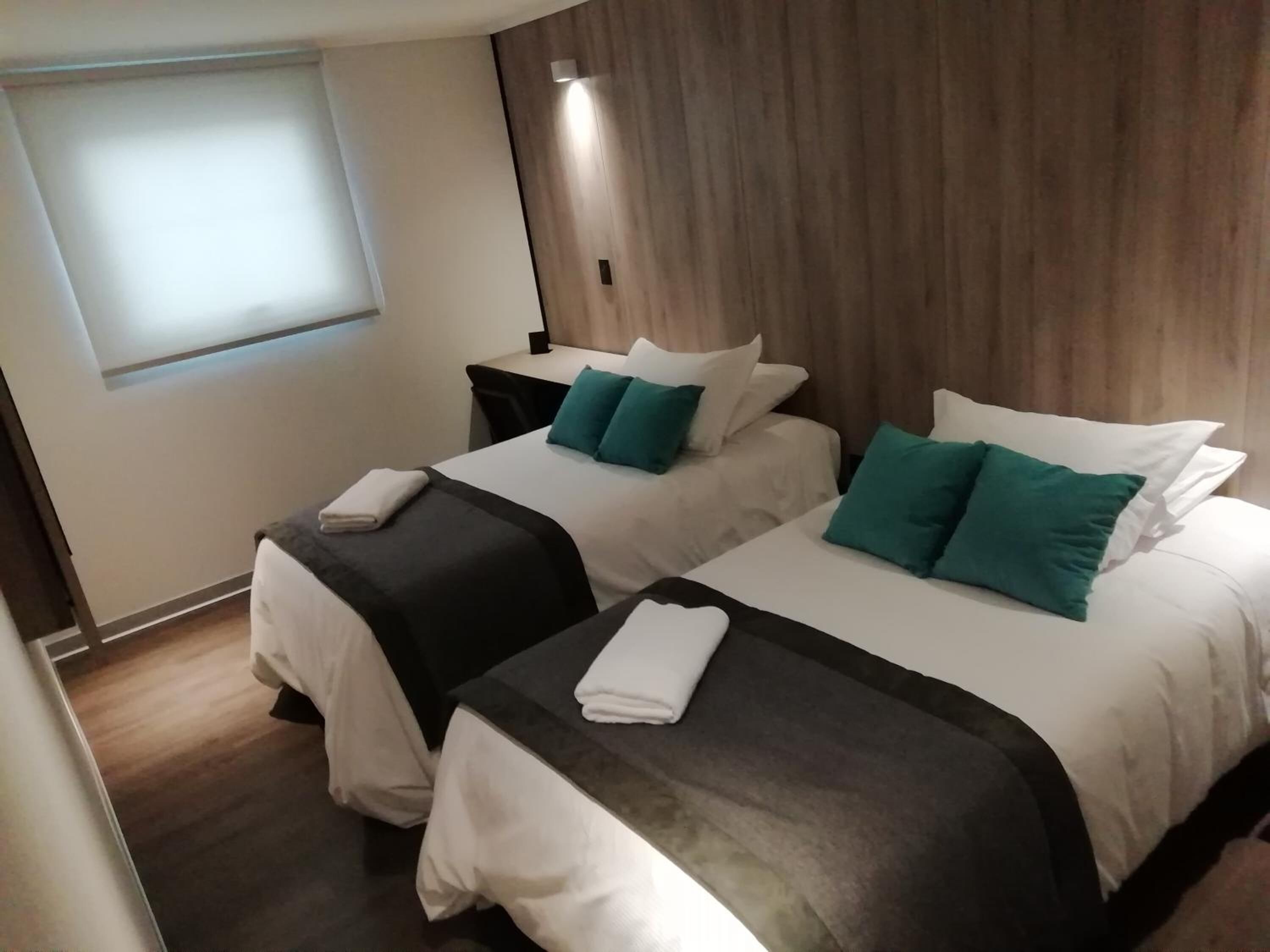 premium bedding, down duvets, minibar, in-room safe