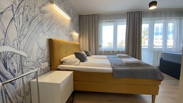 Standaard appartement, 1 kingsize bed, uitzicht op binnenplaats | Luxe beddengoed, verduisterende gordijnen, een strijkplank/strijkijzer