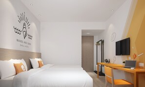A modern hotel room with two beds, a desk with a laptop, and a TV on the wall. - GreenTree Inn Chongqing Longhu Times Tianjie Xietaizi Subway Station Hotel (Chongqing)