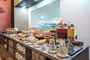 Daily buffet breakfast (USD 15 per person)