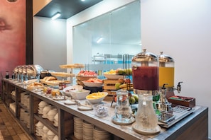Daily buffet breakfast (USD 15 per person)
