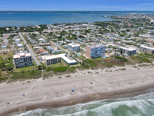 RIGHT ON THE BEACH!!  Rockets and Cruise Ships! Kid and pet friendly, 2Br.  