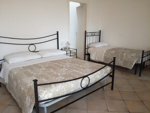 Desk, blackout curtains, free WiFi, bed sheets