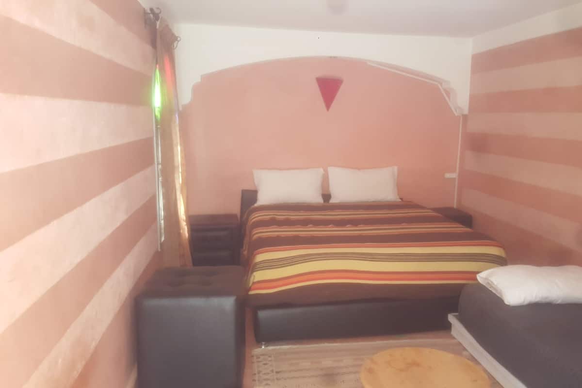 Desk, blackout curtains, iron/ironing board (on request)