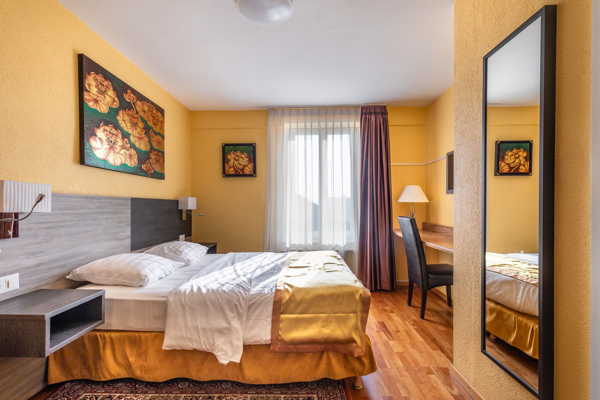 double room, 1 queen bed | individually decorated, individually furnished, desk, blackout curtains