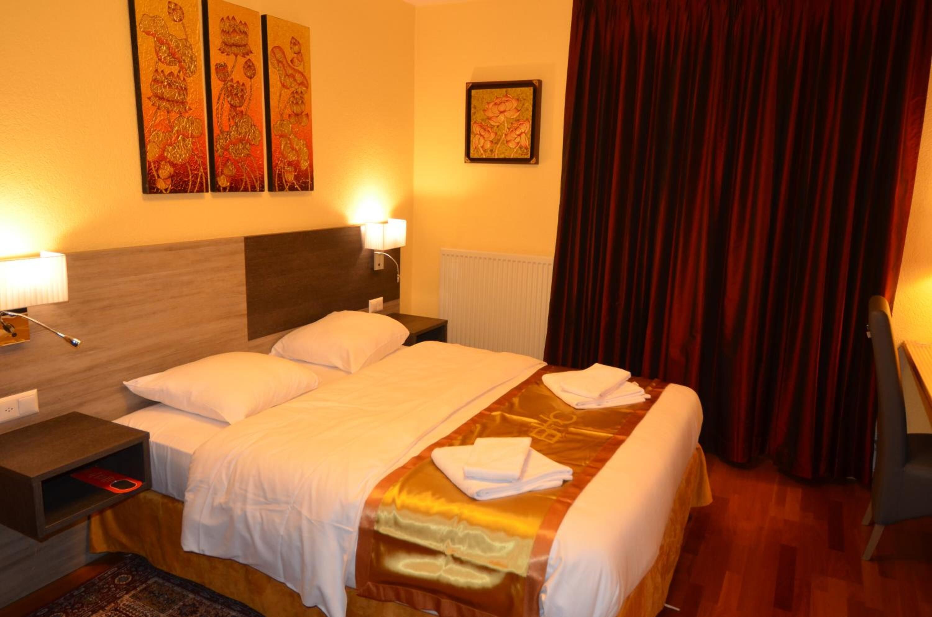 individually decorated, individually furnished, desk, blackout curtains