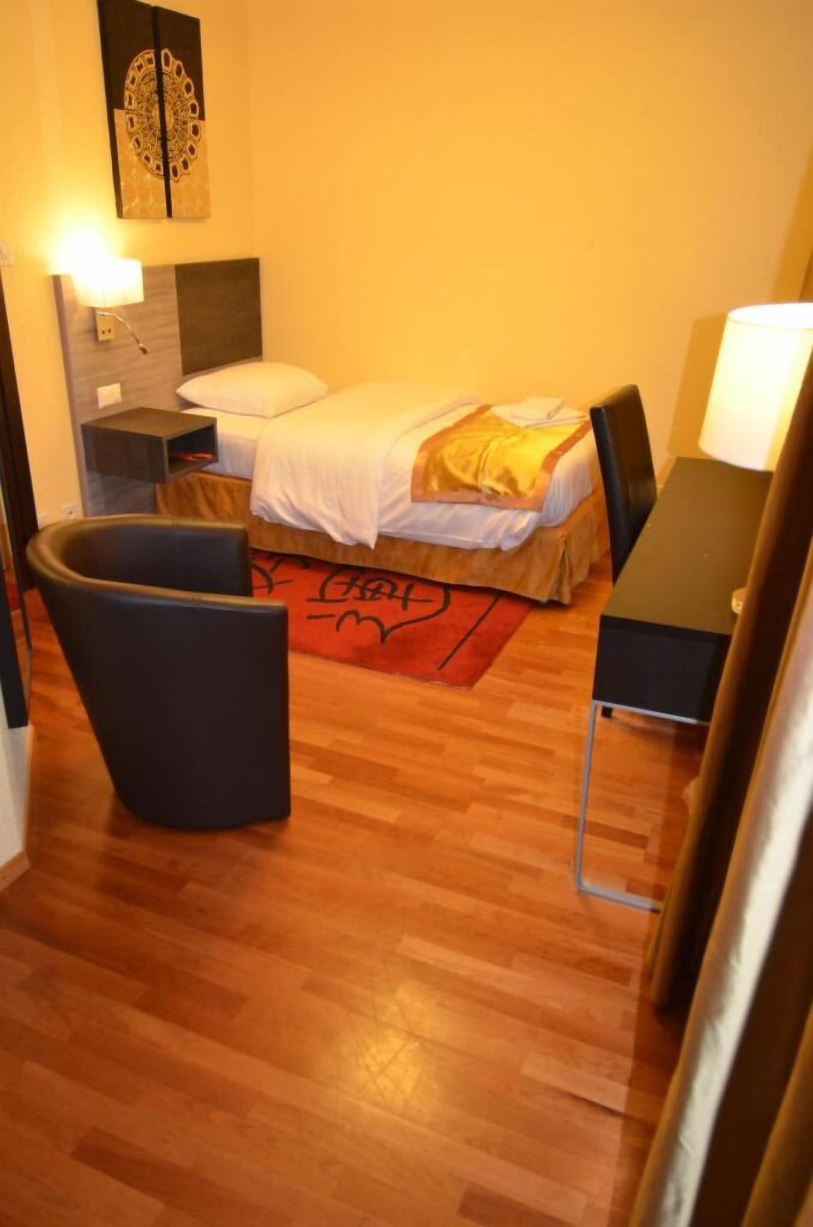 individually decorated, individually furnished, desk, blackout curtains