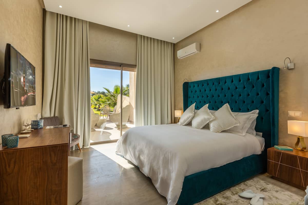 Deluxe Room | 3 bedrooms, hypo-allergenic bedding, down comforters