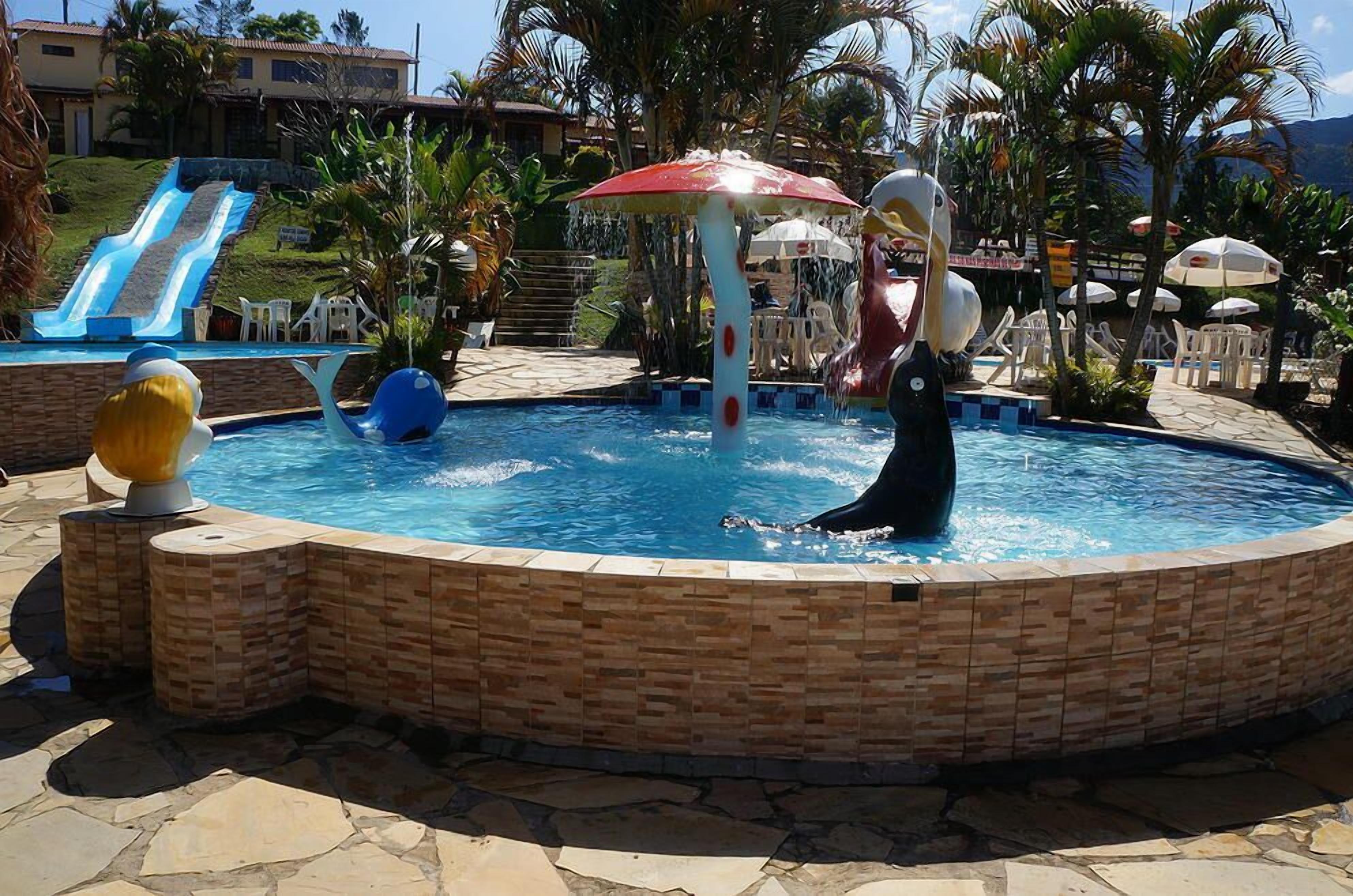 10 outdoor pools, pool umbrellas, pool loungers