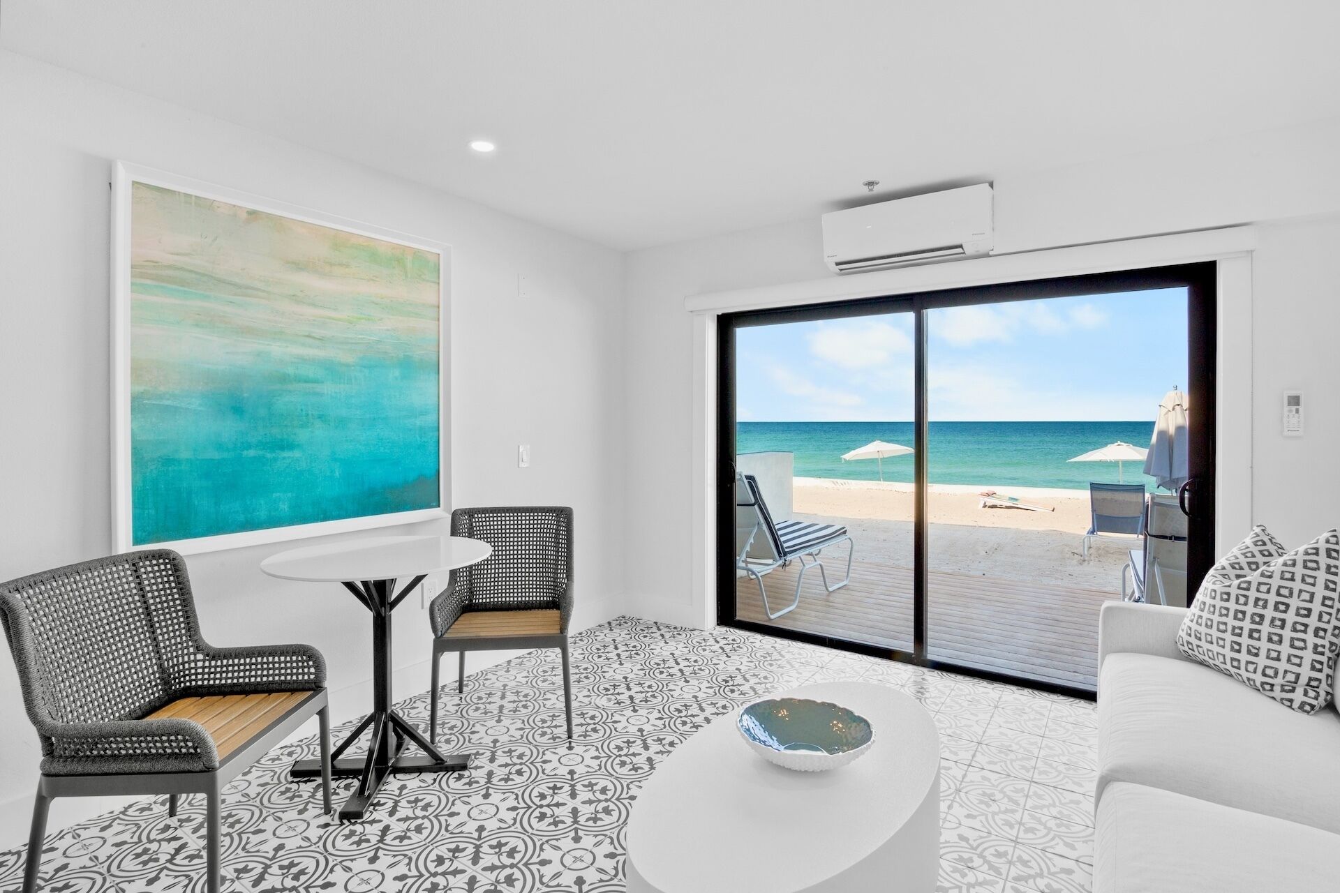 beachfront luxury king room | living area | 55-inch smart tv with cable channels, tv