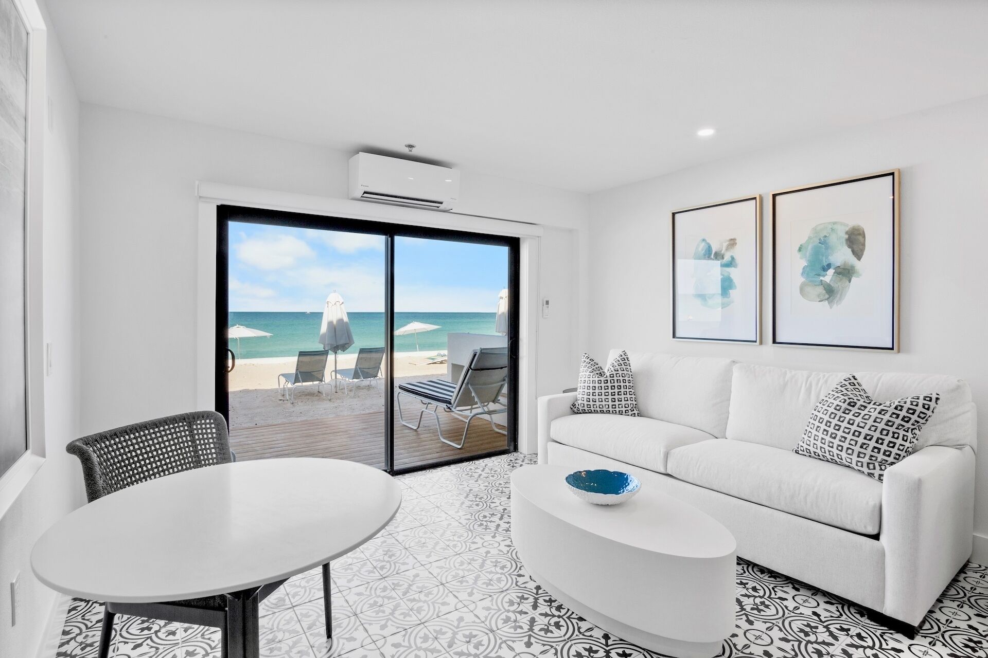 beachfront luxury king room | living area | 55-inch smart tv with cable channels, tv