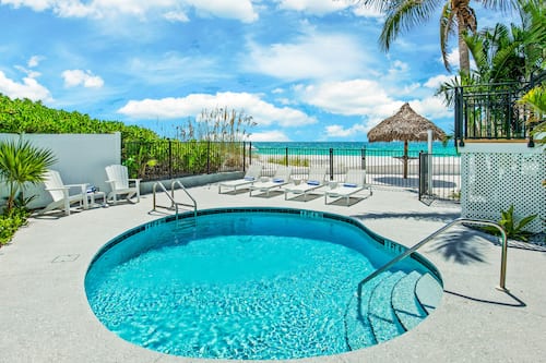 Outdoor pool, pool umbrellas, pool loungers