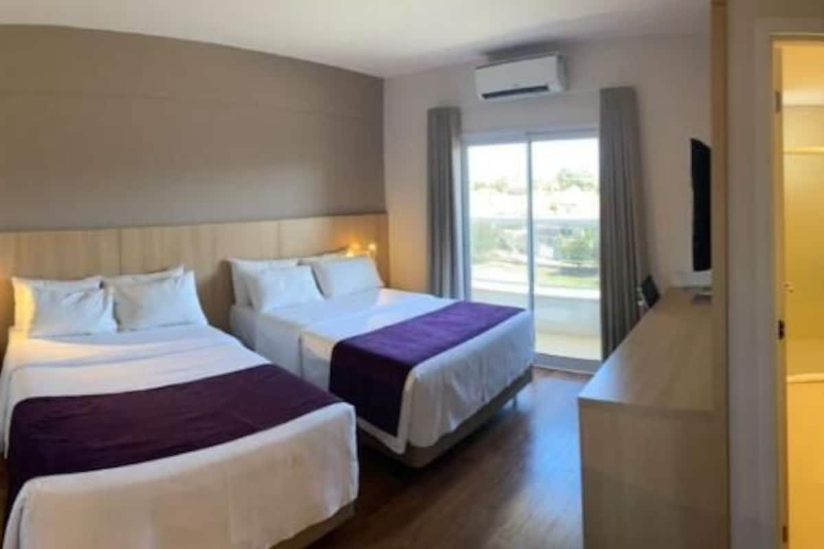 standard quadruple room, 2 queen beds | 1 bedroom, minibar, in-room safe, desk