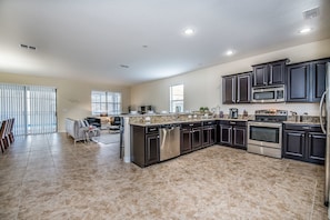 House, Multiple Beds | Private kitchen