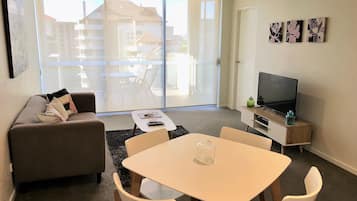 Exclusive Apartment, 2 Bedrooms, 2 Bathrooms, River View | Living area | 42-inch flat-screen TV with digital channels, Smart TV
