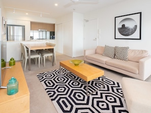 Exclusive Apartment, 2 Bedrooms | Living area | 42-inch flat-screen TV with digital channels, Smart TV