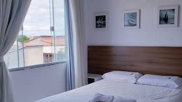 Double Room, Partial Ocean View (Plus) | Minibar, desk, blackout curtains, iron/ironing board