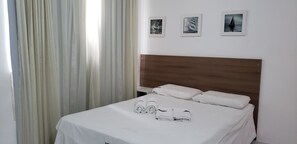 Basic Double Room, Partial Ocean View (Plus) | Minibar, desk, blackout drapes, iron/ironing board - Pousada Restaurante Juscelino e Lazer (Tibau)