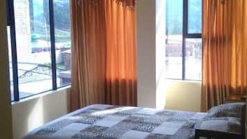 Deluxe Quadruple Room, 2 Double Beds, Bathtub, City View