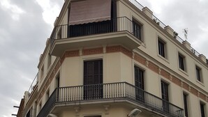 A multi-story building with a ground-floor shop named "MASSO". - The Sky penthouse in the center of town with panoramic views and sunny terrace (Sitges)