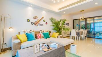 Apartment, 3 Bedrooms | Living room | Flat-screen TV