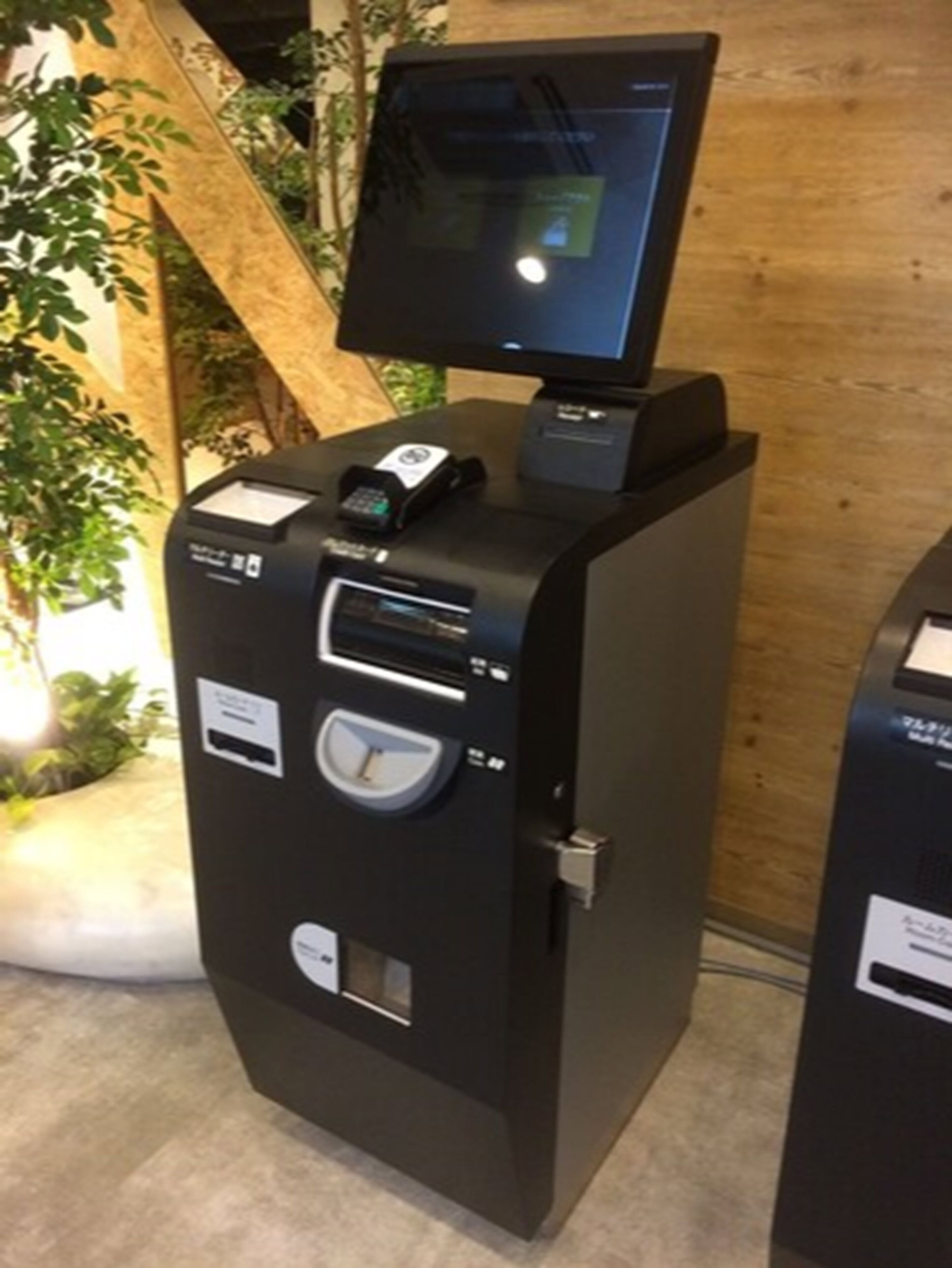Kios check-in/check-out