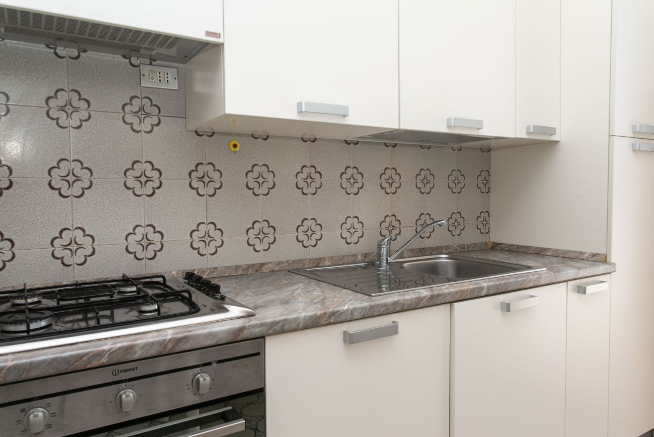 Een koelkast, een oven, een vaatwasser