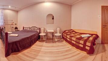 Family Quadruple Room, Multiple Beds, Courtyard View | In-room safe, desk, iron/ironing board, rollaway beds