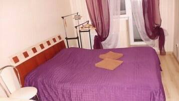 Family Triple Room, Multiple Beds, City View | In-room safe, desk, iron/ironing board, rollaway beds