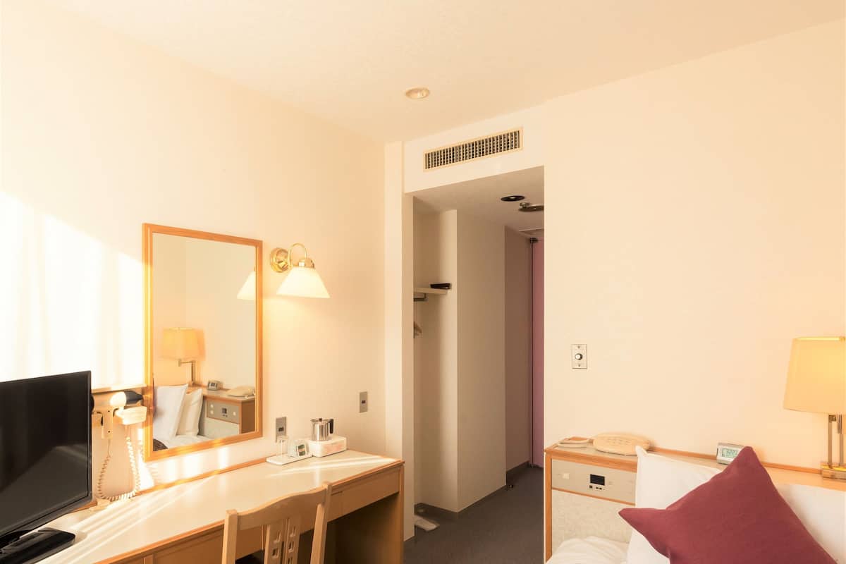 Desk, blackout curtains, iron/ironing board (on request), free WiFi