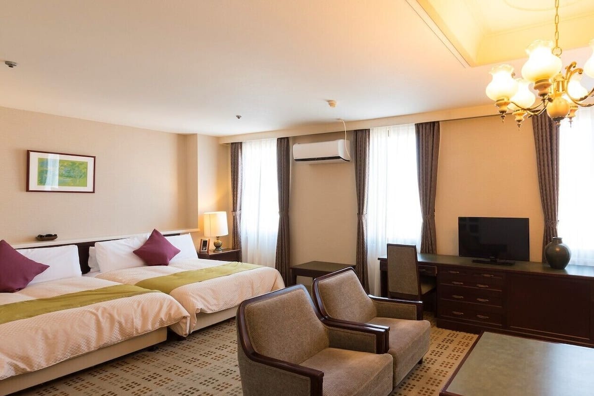Desk, blackout curtains, iron/ironing board (on request), free WiFi