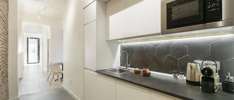 Full-sized fridge, microwave, espresso maker, electric kettle