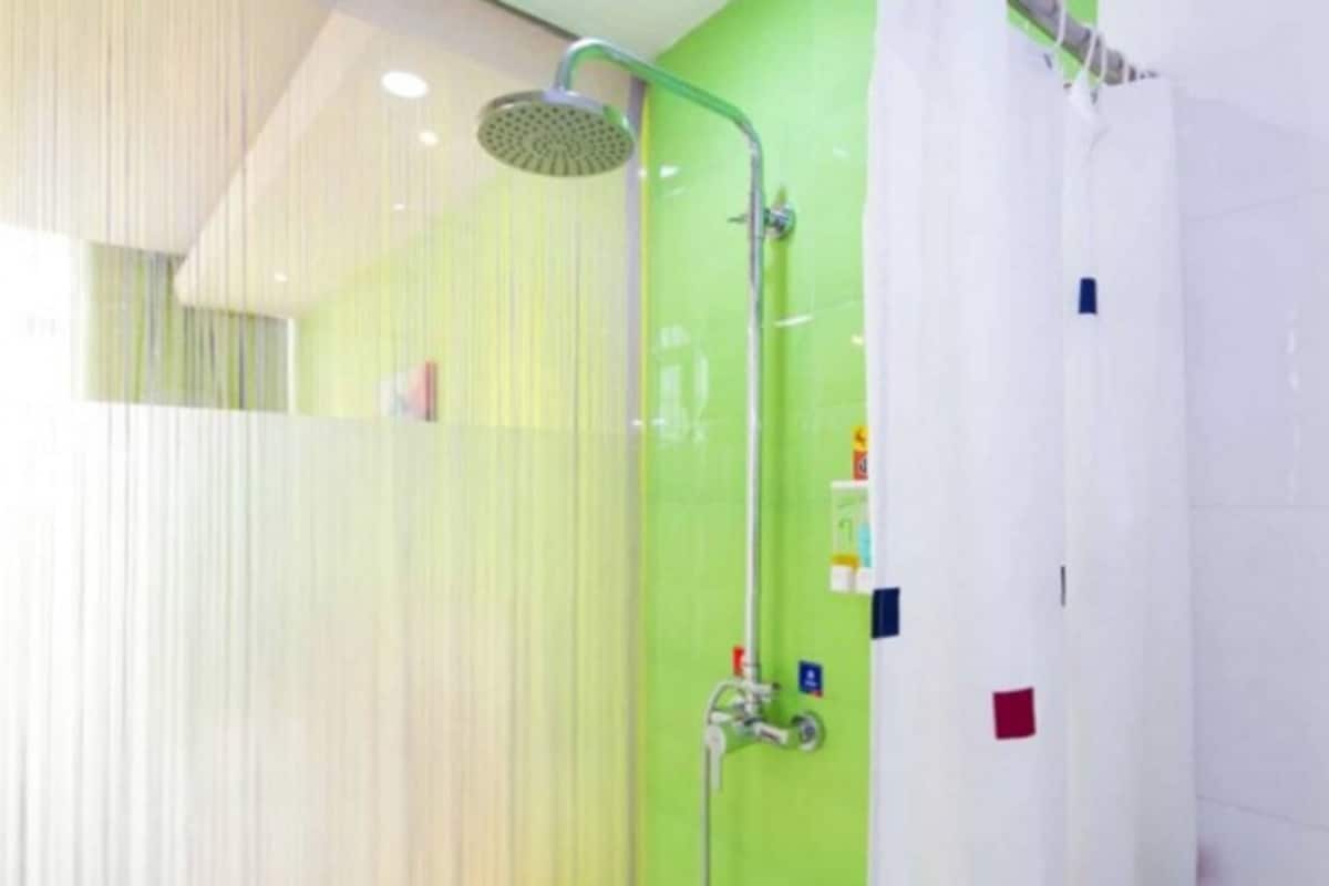 Shower, free toiletries, hair dryer, slippers