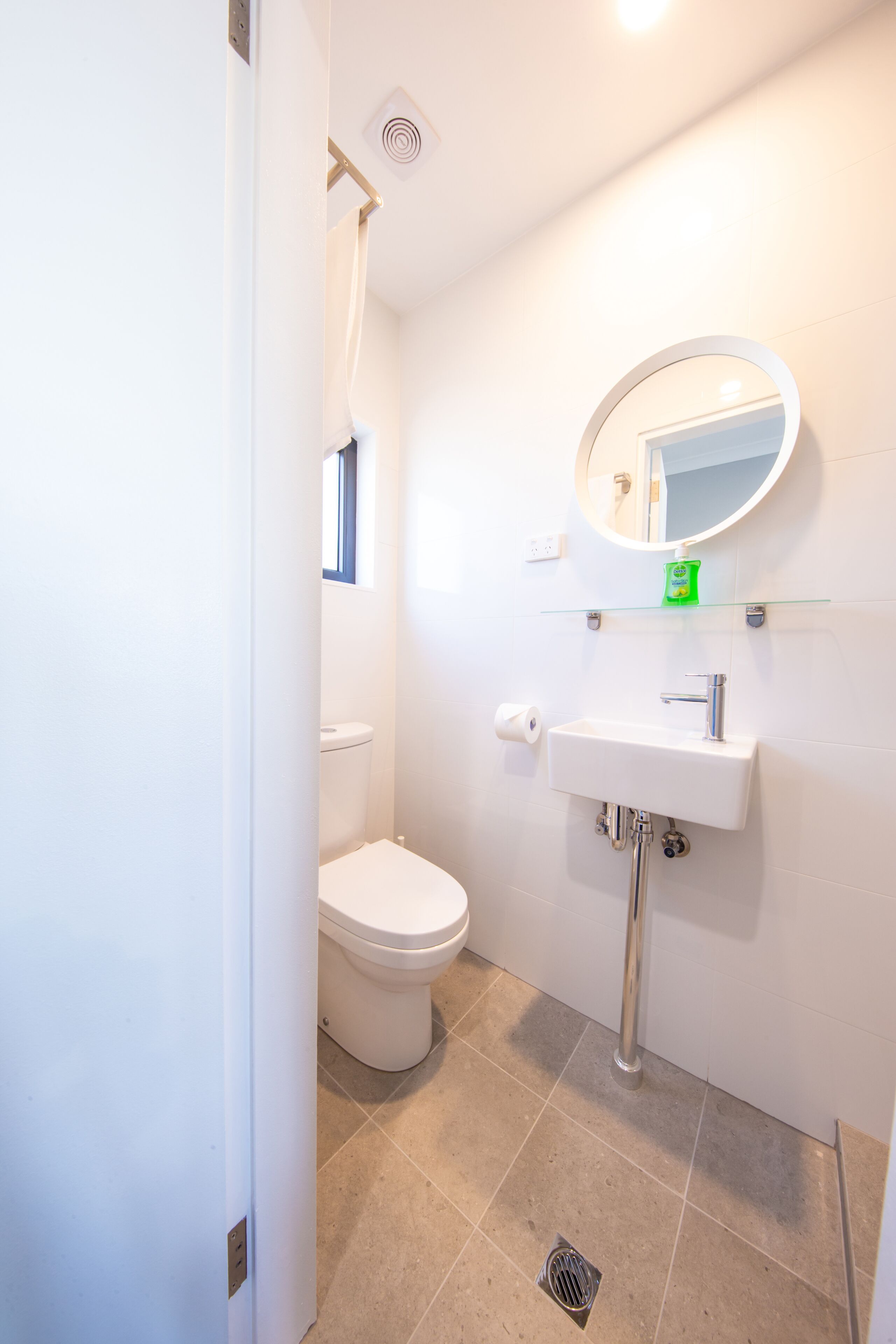 deluxe family room | bathroom | shower, hair dryer, towels, soap