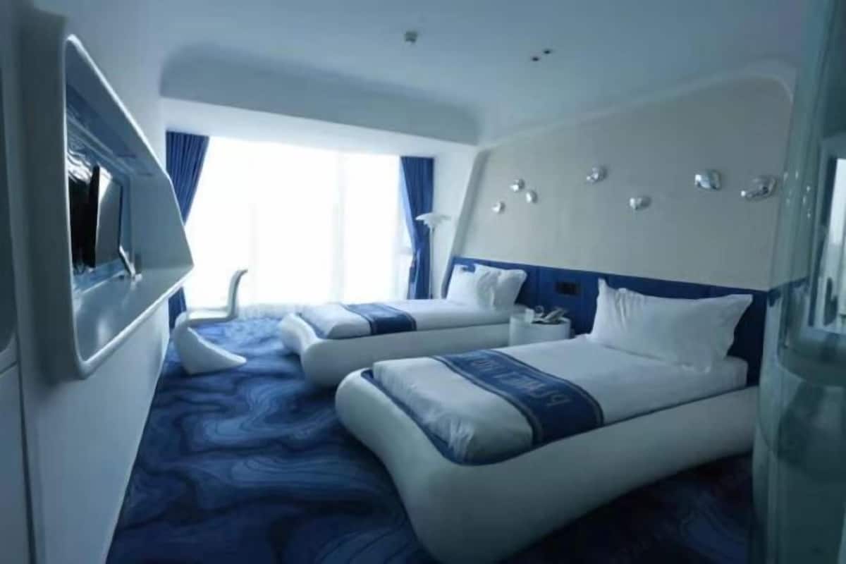 1 kamar tidur, seprai premium, minibar, dan brankas
