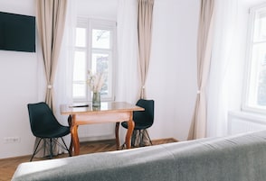 Standard Studio, River View (Lili) | Living area | Flat-screen TV