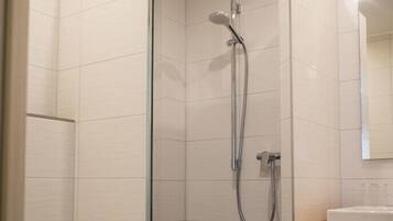 Standard Double Room, 1 Queen Bed | Bathroom | Shower, hair dryer, towels, soap