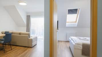 Apartament Comfort, 1 dormitori | Sala d'estar | Televisor de pantalla plana