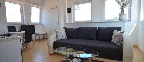 Lejlighed - 1 soveværelse | Opholdsområde | Fladskærms-tv