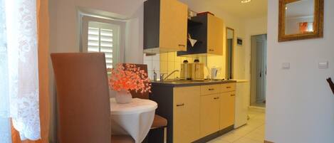 Fridge, stovetop, cookware/dishes/utensils