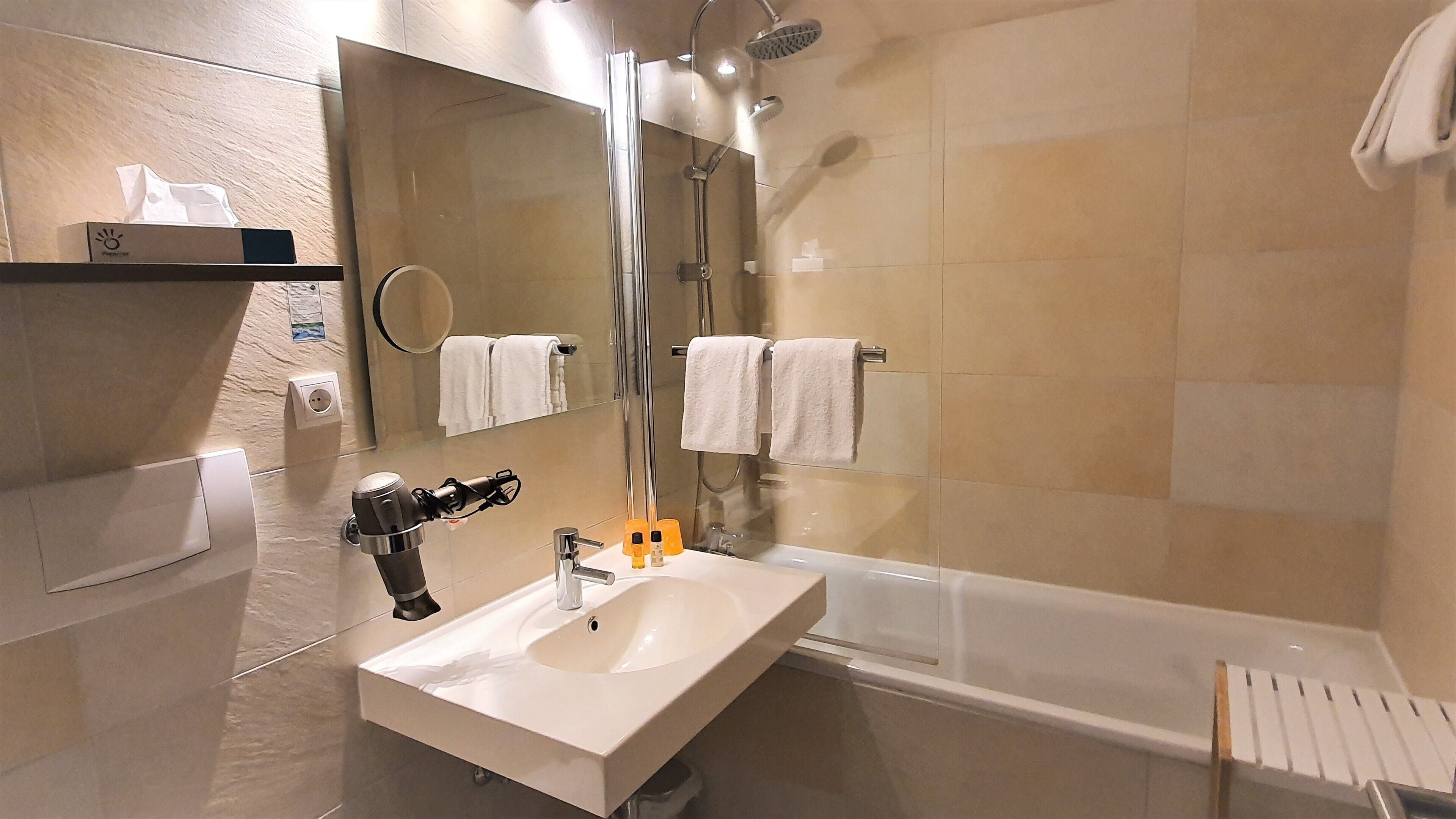 superior double room | bathroom | free toiletries, hair dryer, towels