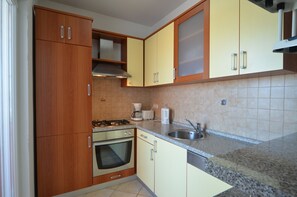 Leilighet, 3 soverom | Eget kjøkken | Kjøleskap, mikrobølgeovn, ovn og kokeplater